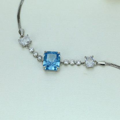 92.5 Sterling Silver Bracelet with Rectangular Light Blue Center Stone