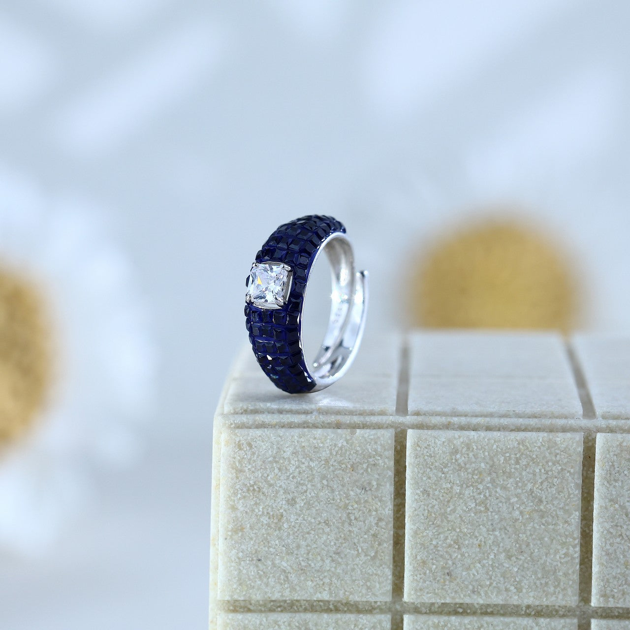 92.5 Sterling Silver Blue Stone Band Ring with Single CZ Centerpiece
