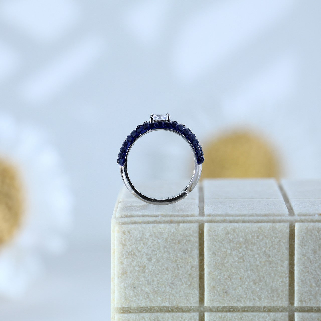 92.5 Sterling Silver Blue Stone Band Ring with Single CZ Centerpiece