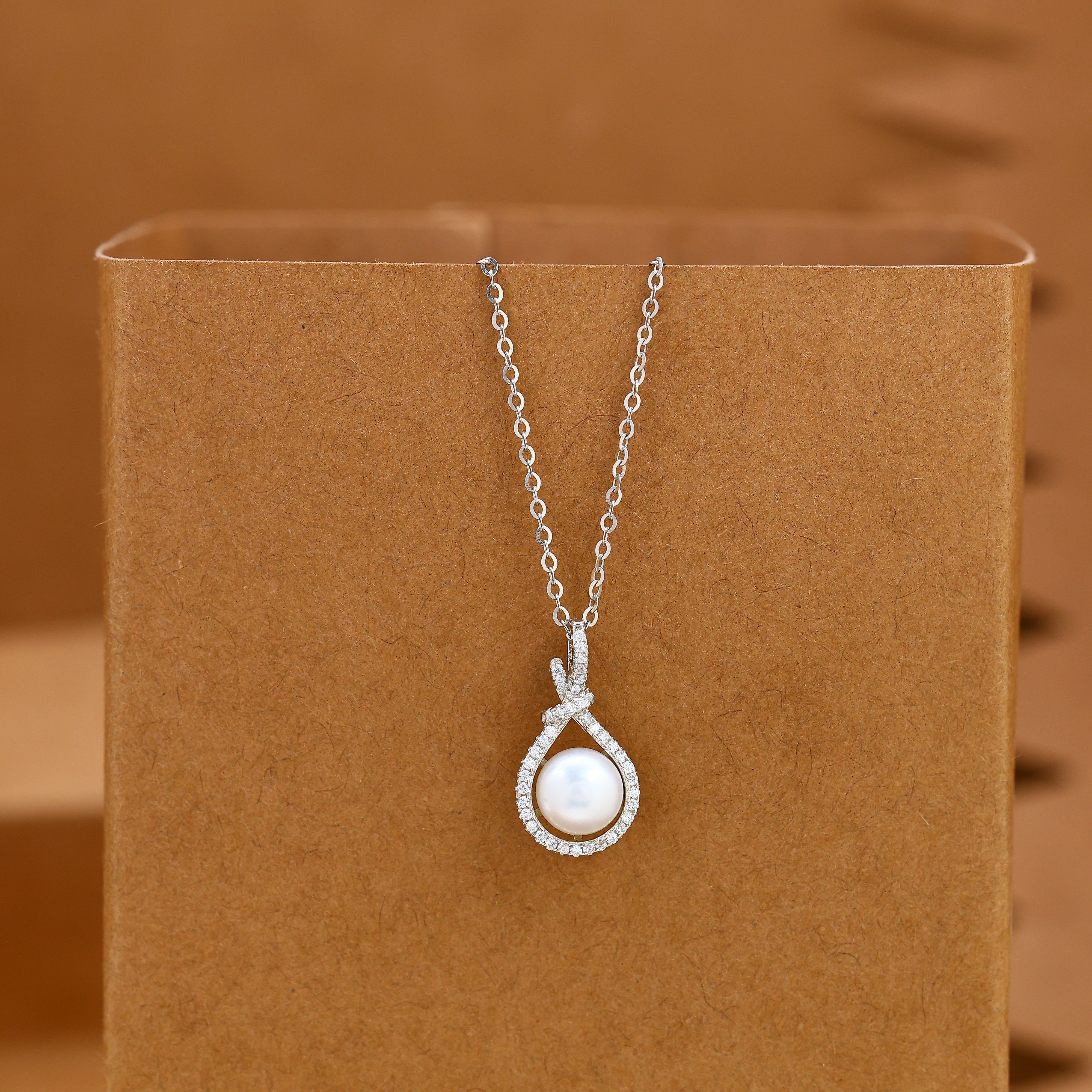 Graceful Knot Pearl Halo Necklace- 92.5 Silver