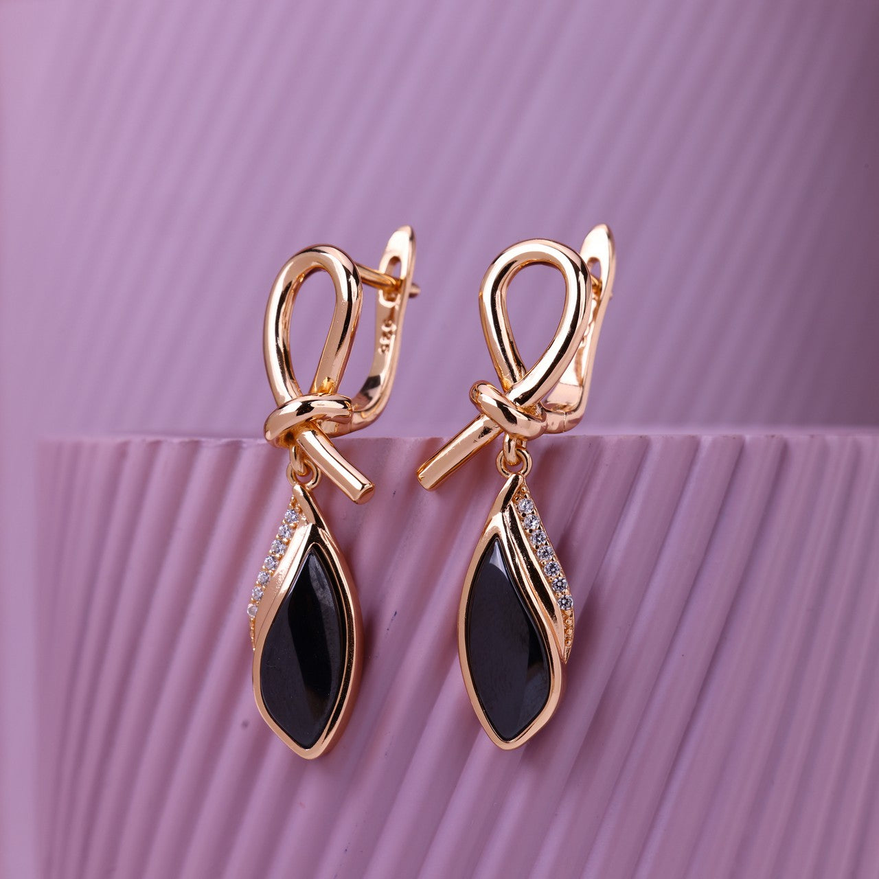 Twilight Knot Silver Rose Earrings