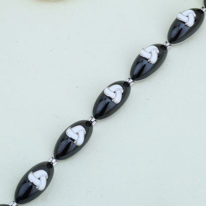 BLACK CAMEO WITH VINTAGE FINISH SILVER BRACELETS