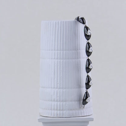 BLACK CAMEO WITH VINTAGE FINISH SILVER BRACELETS